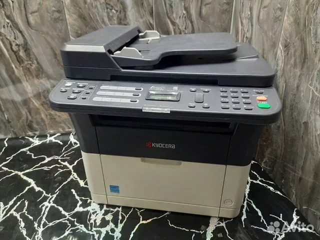 Лазерное мфу 3 в 1 Kyocera FS-1120MFP. Гарантия